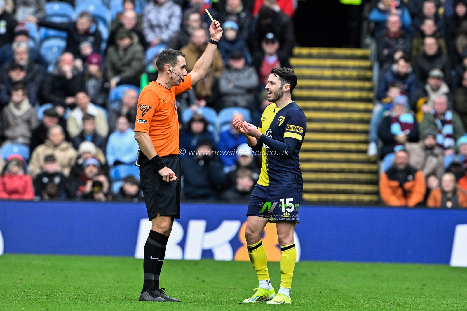 Adam Smith of Bournemouth is shown a yellow card by referee David Coote during the Premier League match Burnley vs Bournemouth at Turf Moor, Burnley, United Kingdom, 3rd March 2024

(Photo by Cody Froggatt/News Images)