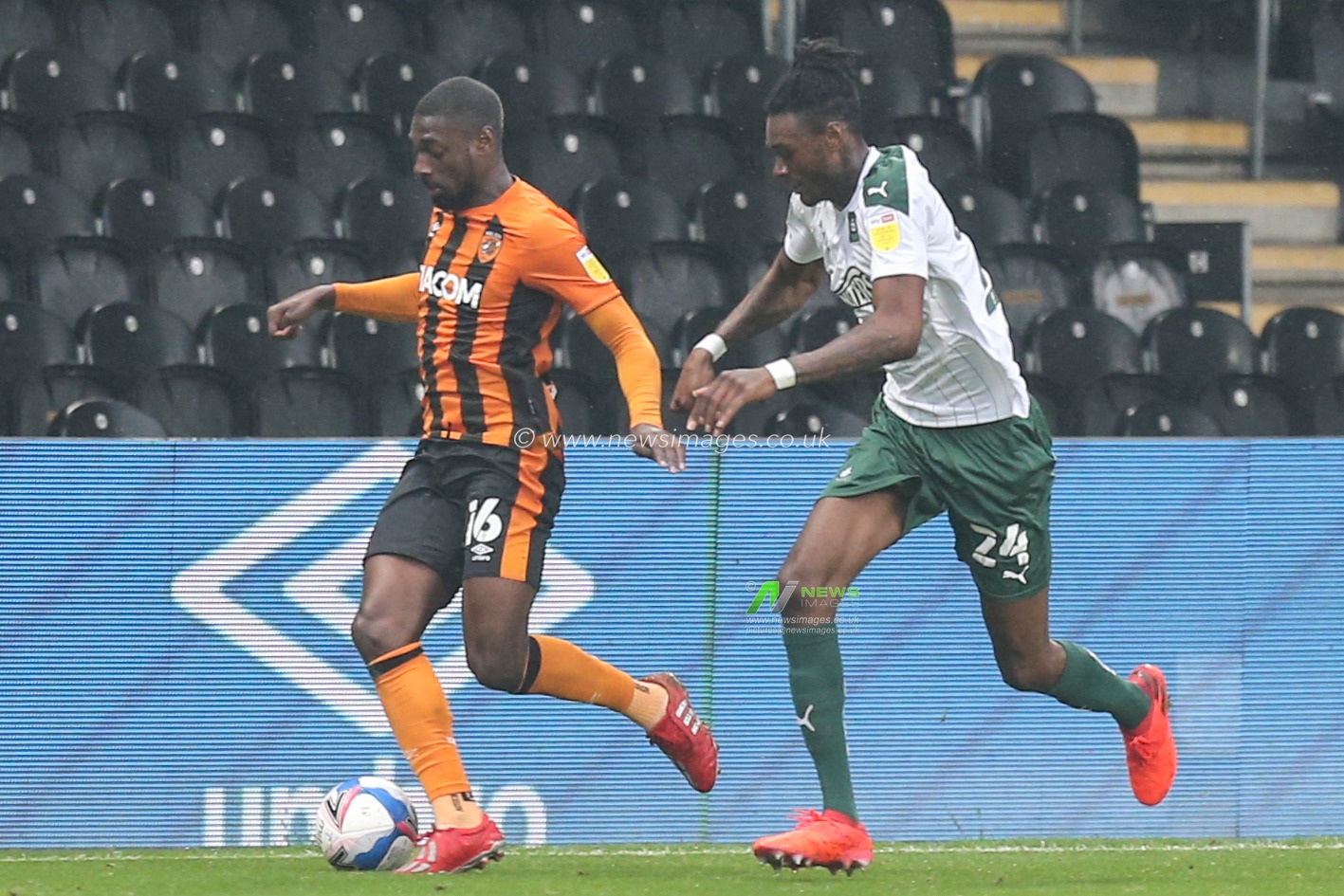 Hakeed Adelakun (16) of Hull City gets away from Jerome Opoku (24) of Plymouth Argyle