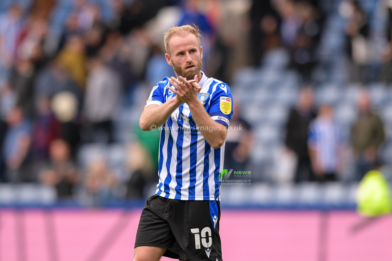 Barry Bannan #10 of Sheffield Wednesday applauds the home supporters at the end of the game