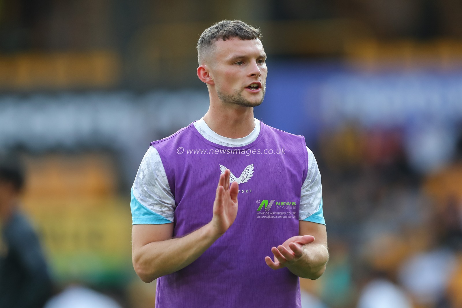 Luke McNally of Burnley warms up ahead of the Carabao Cup match Wolverhampton Wanderers vs Burnley at Molineux, Wolverhampton, United Kingdom, 28th August 2024

(Photo by Gareth Evans/News Images)