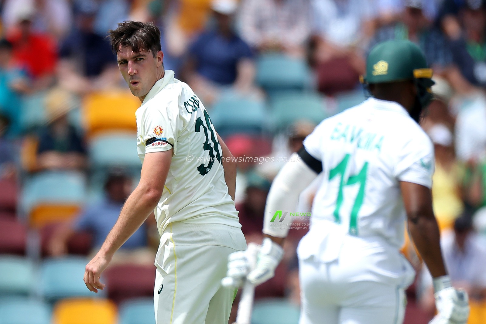 Pat Cummins of Australia looks on toward Temba Bavuma of South Africa during the NRMA Insurance test Series match Australia vs South Africa at The Gabba, Brisbane Cricket Ground, Brisbane, Australia, 17th December 2022

(Photo by Patrick Hoelscher/News Images)