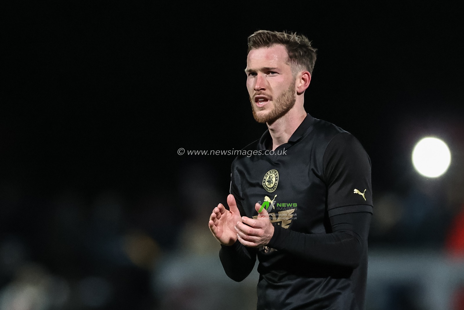 Jamie McCart of Barnsley applauds the travelling fans during the Sky Bet League 1 match Stevenage vs Barnsley at Lamex Stadium, Stevenage, United Kingdom, 9th April 2024

(Photo by Mark Cosgrove/News Images)