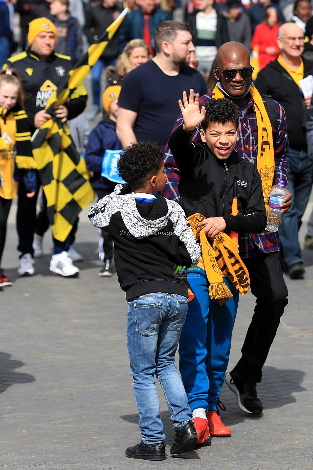 Sutton United fans arrive at the stadium.