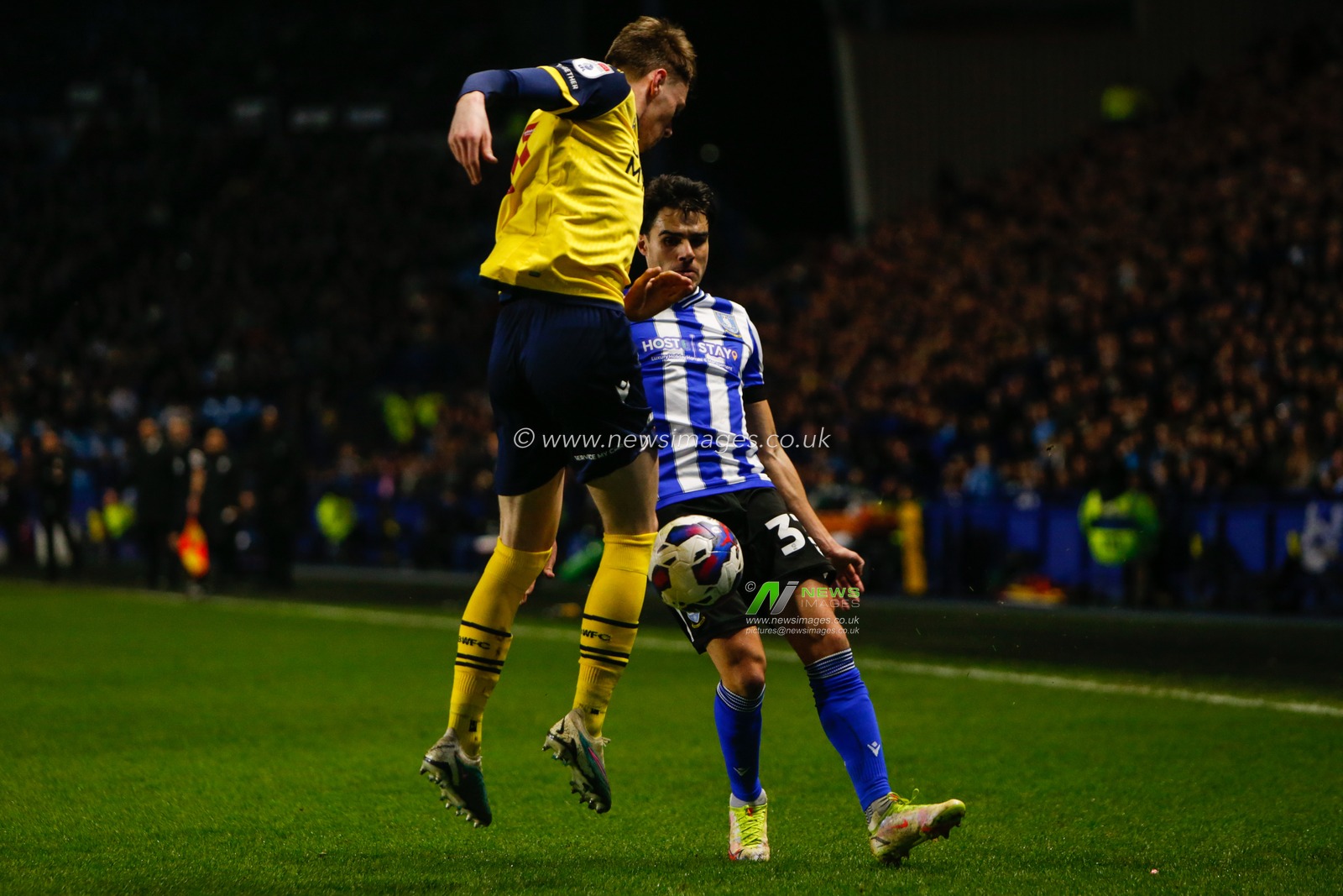 Conor Bradley #21 of Bolton Wanderers and Reece James #33 of Sheffield Wednesday during the Sky Bet League 1 match Sheffield Wednesday vs Bolton Wanderers at Hillsborough, Sheffield, United Kingdom, 17th March 2023

(Photo by Ben Early/News Images)