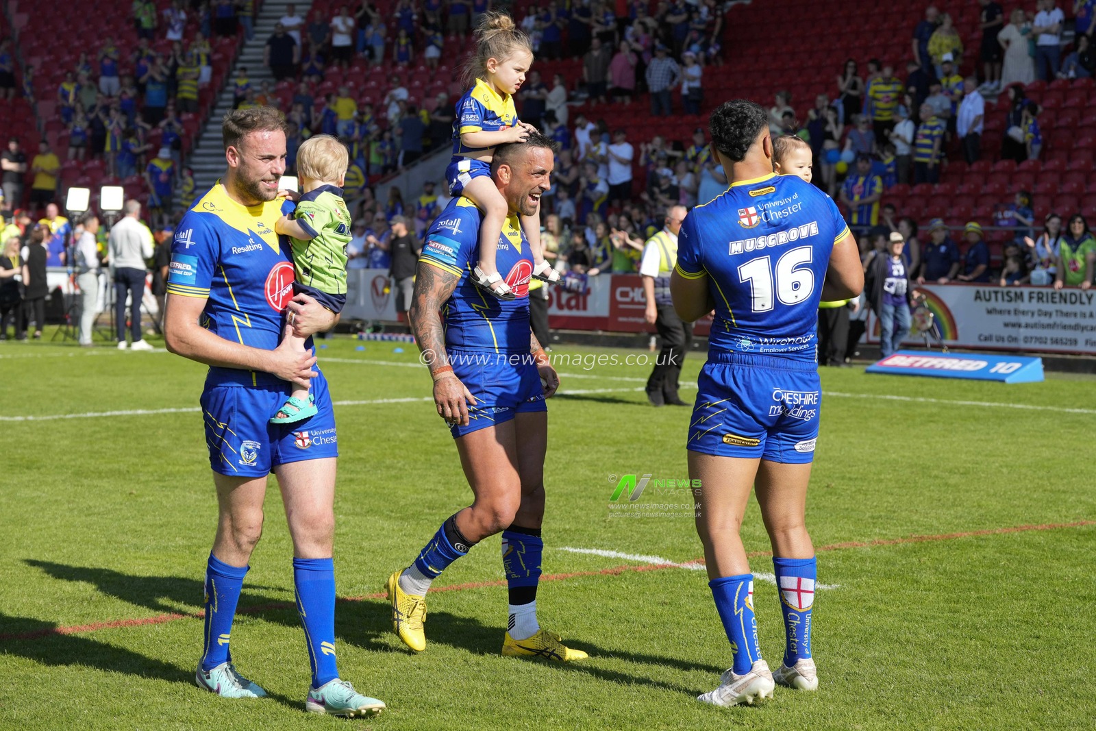 James Harrison, Paul Vaughan and Zane Musgrove of Warrington Wolves celebrate with their children after the Betfred Challenge Cup Semi-Final match Huddersfield Giants vs Warrington Wolves at Totally Wicked Stadium, St Helens, United Kingdom, 19th May 2024

(Photo by Steve Flynn/News Images)