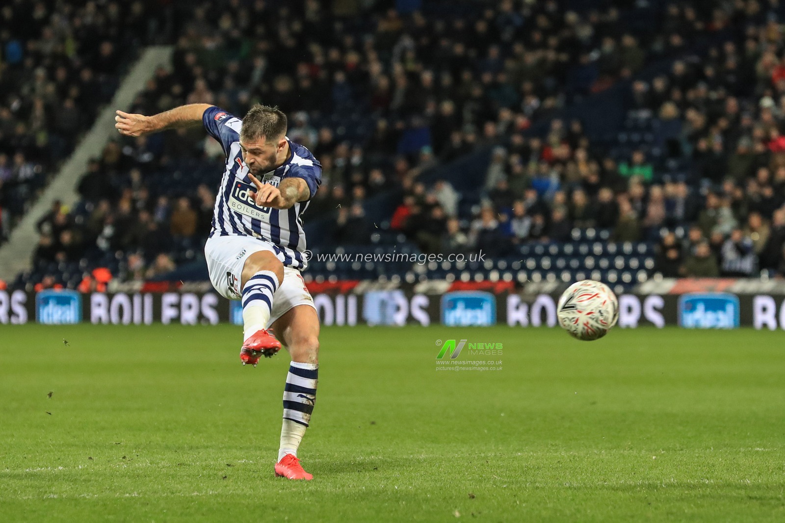 3rd March 2020, The Hawthorns, West Bromwich, England; Emirates FA Cup 5th Round, West Bromwich Albion v Newcastle United : Charlie Austin (15) of West Bromwich Albion shoots on goal and Ahmed Hegazi (26) of West Bromwich Albion puts it out for a corner