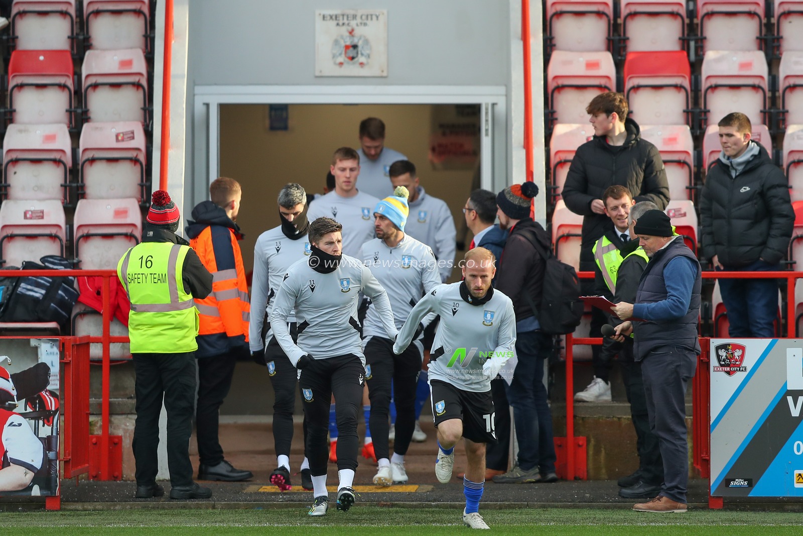 Sheffield Wednesday players come out the tunnel for the pre game warm up ahead of the Sky Bet League 1 match Exeter City vs Sheffield Wednesday at St James' Park, Exeter, United Kingdom, 10th December 2022

(Photo by Gareth Evans/News Images)