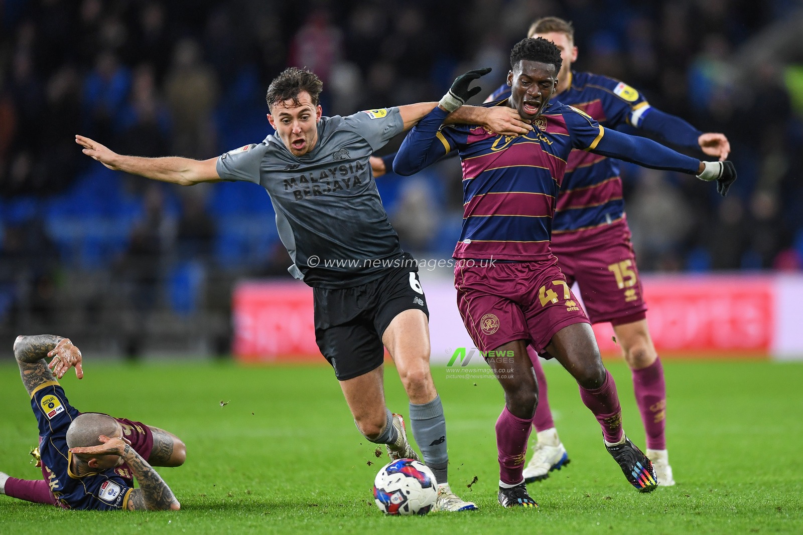 Tim Iroegbunam #47 of QPR Under pressure from Ryan Wintle #6 of Cardiff City  during the Sky Bet Championship match Cardiff City vs Queens Park Rangers at Cardiff City Stadium, Cardiff, United Kingdom, 26th December 2022

(Photo by Mike Jones/News Images)