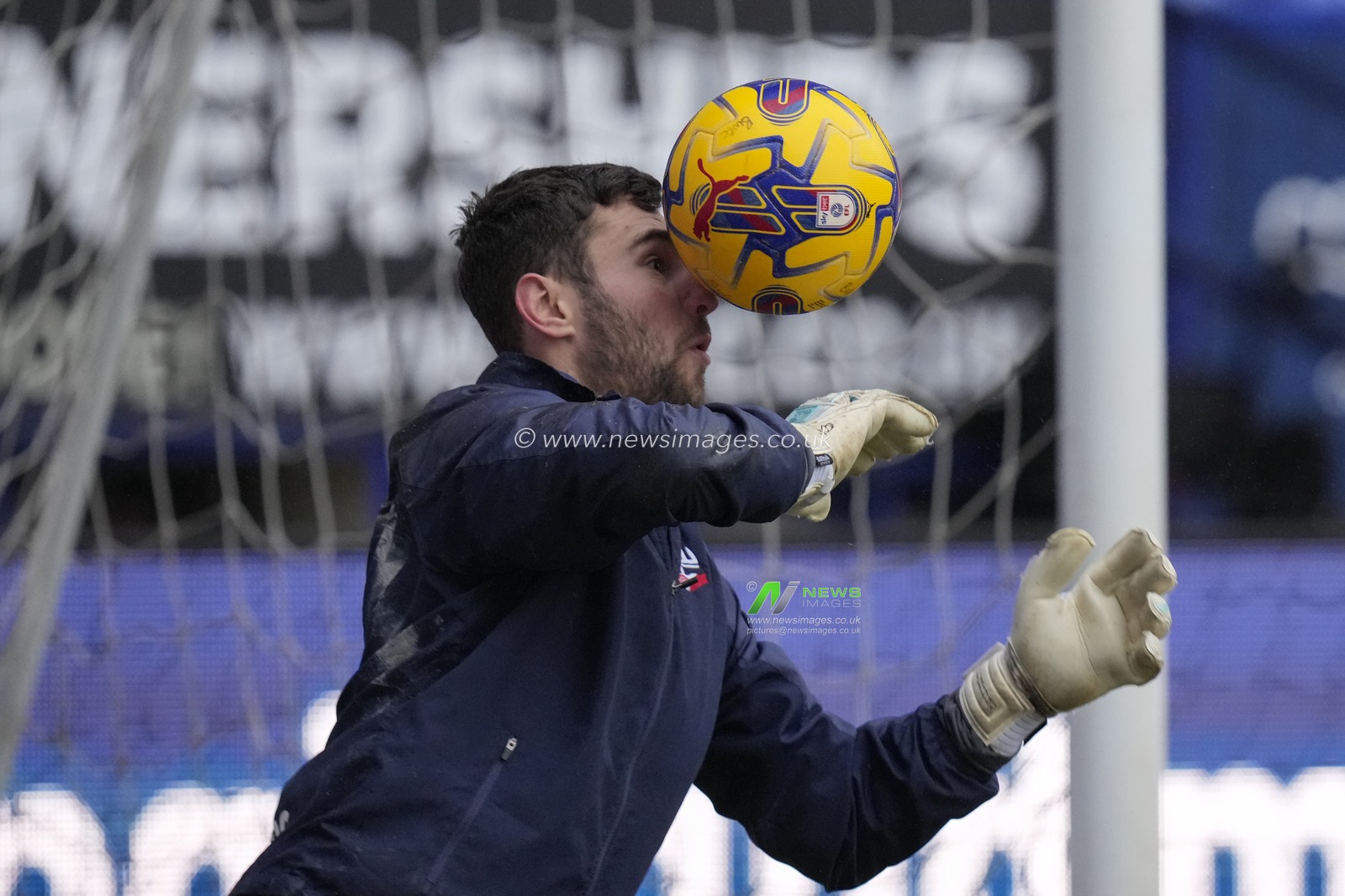 Nathan Baxter of Bolton Wanderers gets a balll in the face as he warms up before the Sky Bet League 1 match Bolton Wanderers vs Cheltenham Town at Toughsheet Community Stadium, Bolton, United Kingdom, 13th January 2024

(Photo by Steve Flynn/News Images)