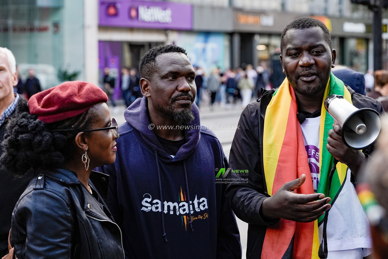 Blessed Mhlanga, Makomborero Haruzvishe and Chenayi Mutambasere UK-based Zimbabweans gather outside the Zimbabwe Embassy in London on 18 April 2026 to protest the Constitution of Zimbabwe Amendment (No. 3) Bill, which critics say would extend President Mnangagwa’s rule until 2030 and strip citizens of the direct vote for president.

(Photo by Maynard Manyowa/News Images)