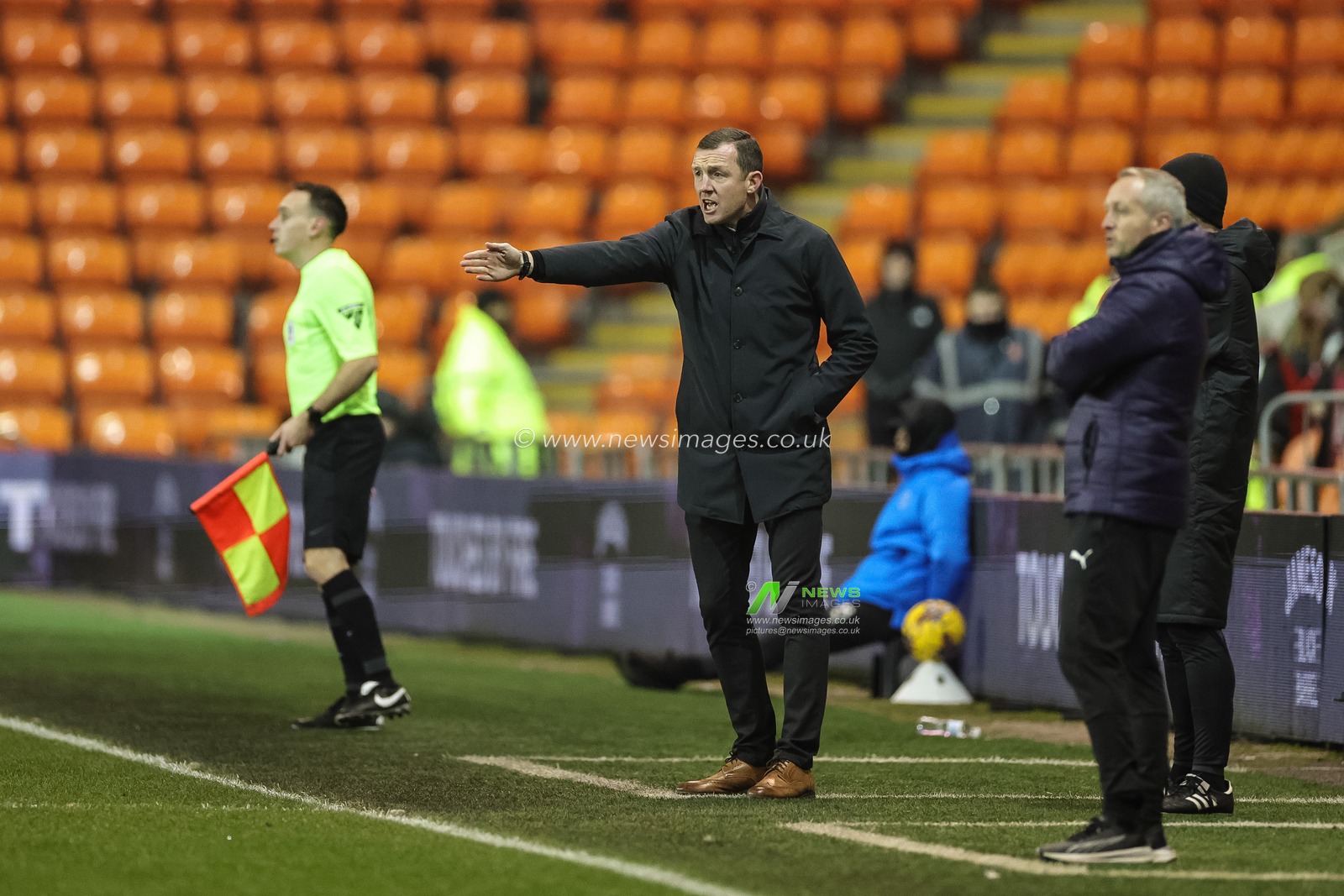 Neill Collins Head coach of Barnsley gives his team instructions during the Bristol Street Motors Trophy match Blackpool vs Barnsley at Bloomfield Road, Blackpool, United Kingdom, 5th December 2023

(Photo by Mark Cosgrove/News Images)