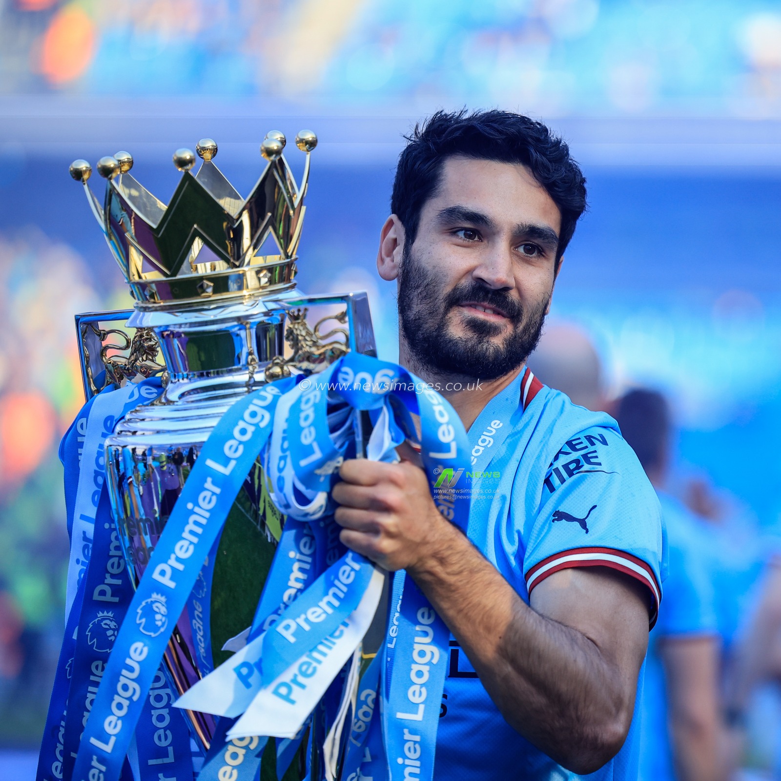 Ä°lkay GÃ¼ndoÄŸan #8 of Manchester City kisses the Premier League Trophy during the Premier League match Manchester City vs Chelsea at Etihad Stadium, Manchester, United Kingdom, 21st May 2023

(Photo by Conor Molloy/News Images)