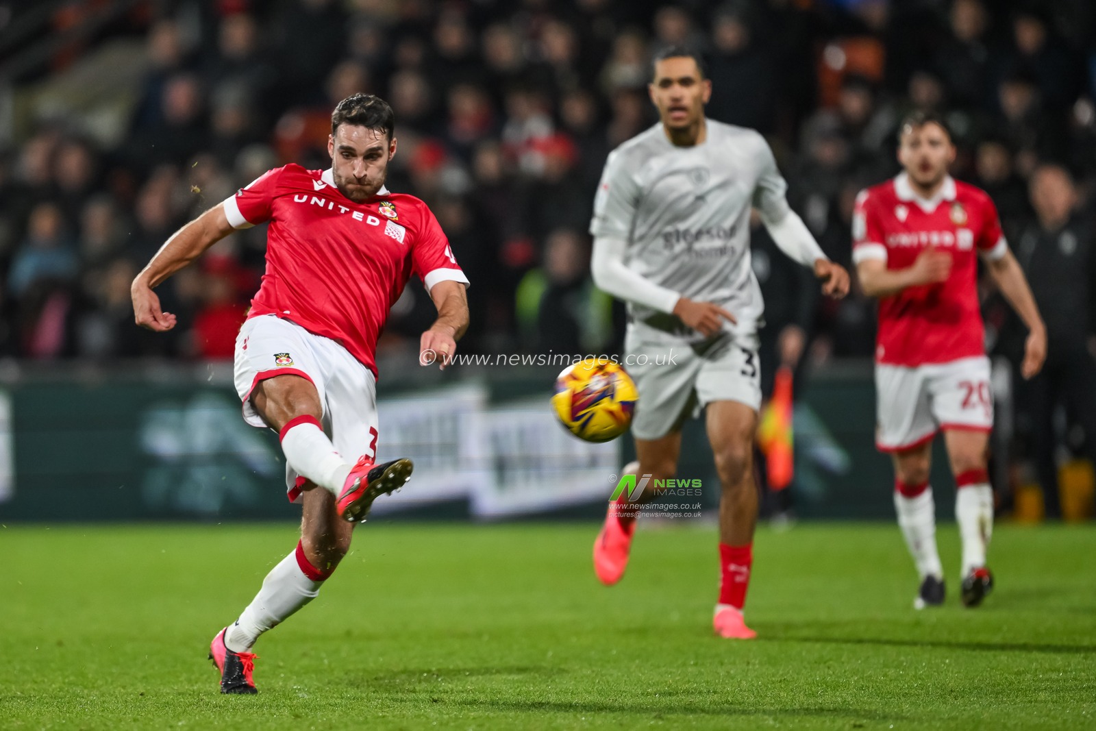 Matthew James of Wrexham shoots on goal during the Sky Bet League 1 match Wrexham vs Barnsley at SToK Cae Ras, Wrexham, United Kingdom, 3rd December 2024

(Photo by Craig Thomas/News Images)