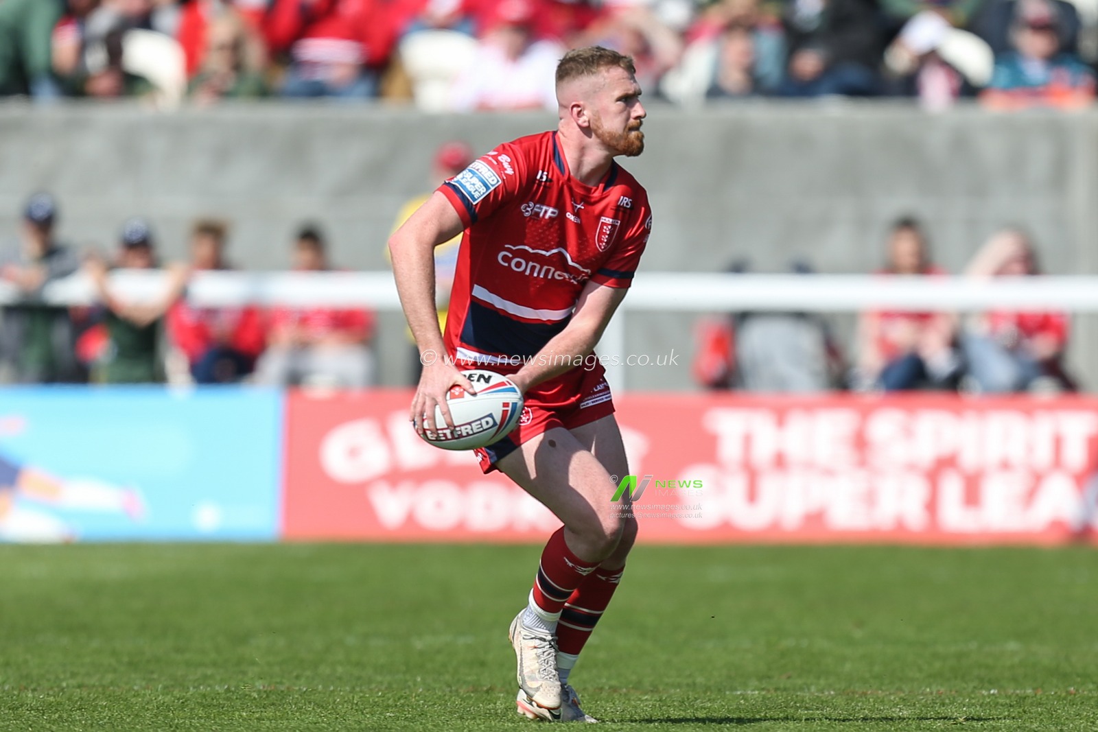 Rowan Milnes #21 of Hull KR in action during the game