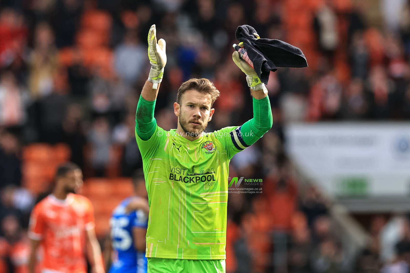 Chris Maxwell #1 of Blackpool applauds the fans after Blackpool won 6-1