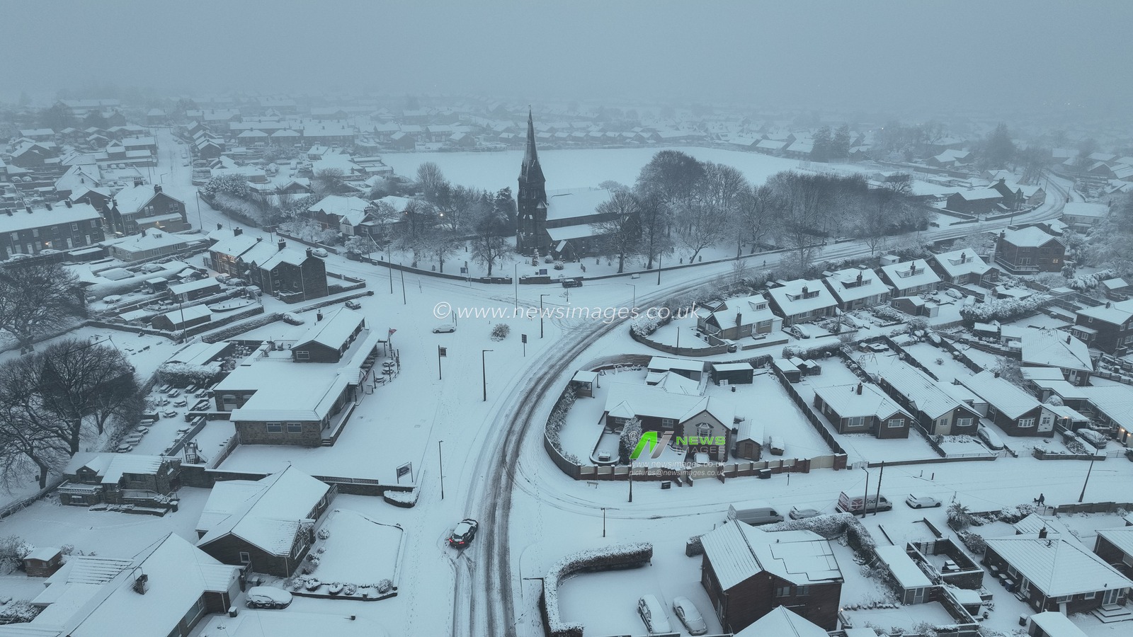 A car gets stuck in the snow as heavy Snow falls in the village of Monk Bretton after a amber weather warning was issues overnight, Monk Bretton, Barnsley, United Kingdom, 5th January 2025

(Photo by Mark Cosgrove/News Images)