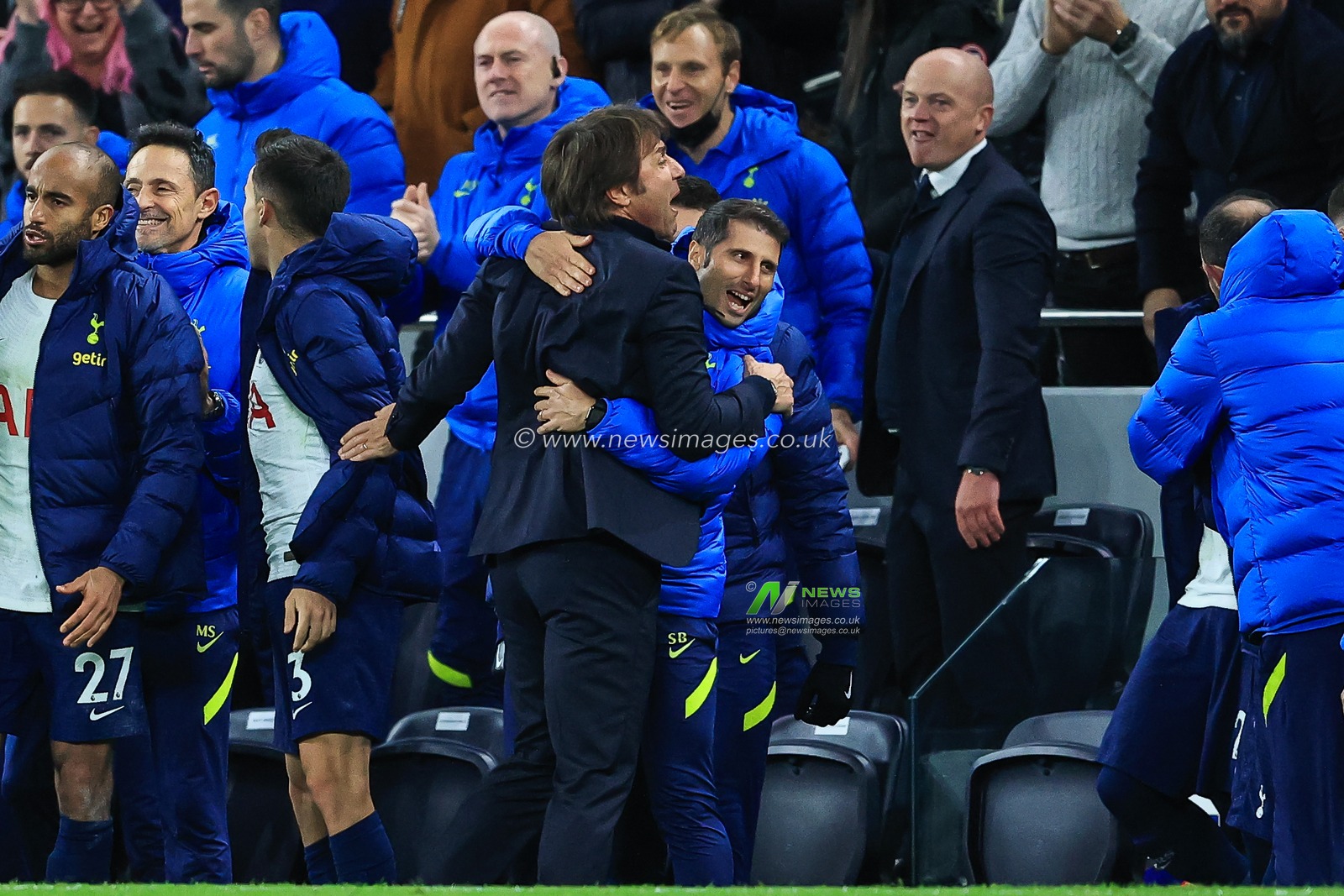 Antonio Conte manager of Tottenham Hotspur celebrates with his bench