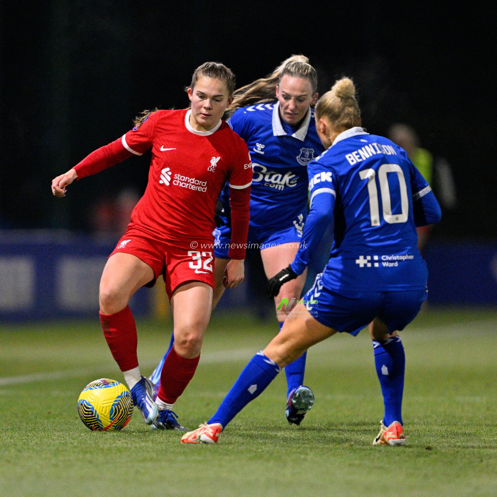 Lucy Parry 32# of Liverpool Women's Football Club holds the ball while under pressure from Toni Duggan #9 of Everton Women and Hanna Bennison #10 of Everton Women, during the FA Women's League Cup match Everton Women vs Liverpool Women at Walton Hall Park Stadium, Liverpool, United Kingdom, 13th December 2023

(Photo by Cody Froggatt/News Images)