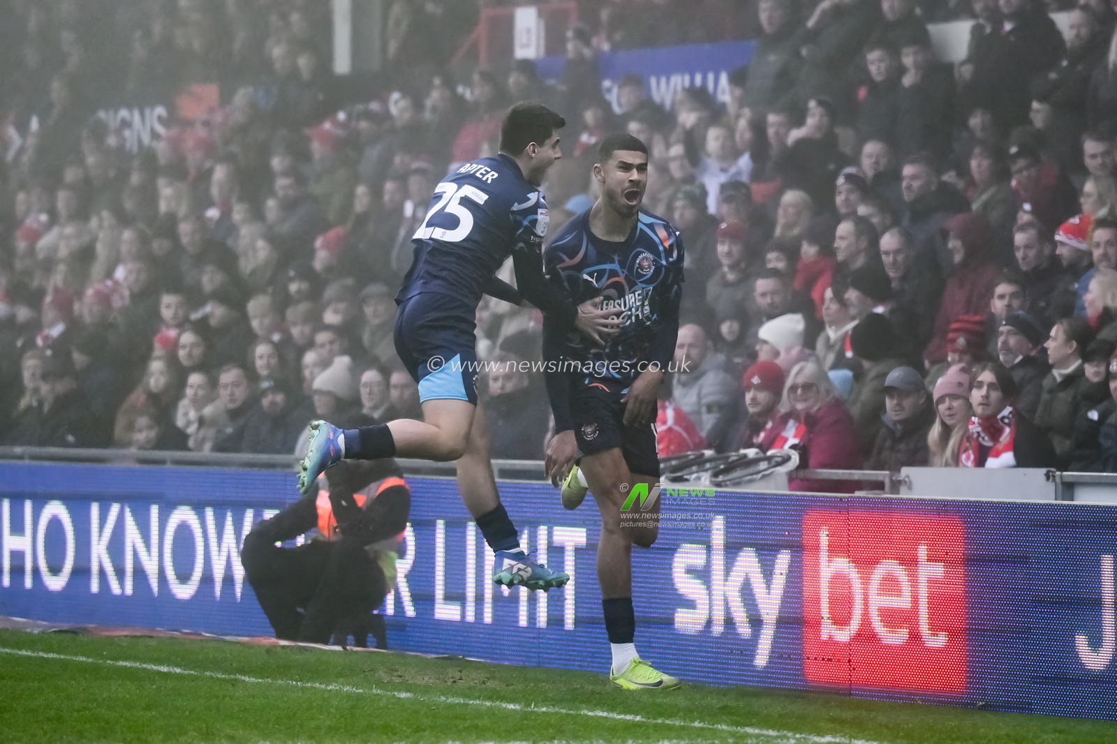 Ashley Fletcher of Blackpool celebrates his goal to make it 0-1 during the Sky Bet League 1 match Wrexham vs Blackpool at SToK Cae Ras, Wrexham, United Kingdom, 26th December 2024

(Photo by Craig Thomas/News Images)