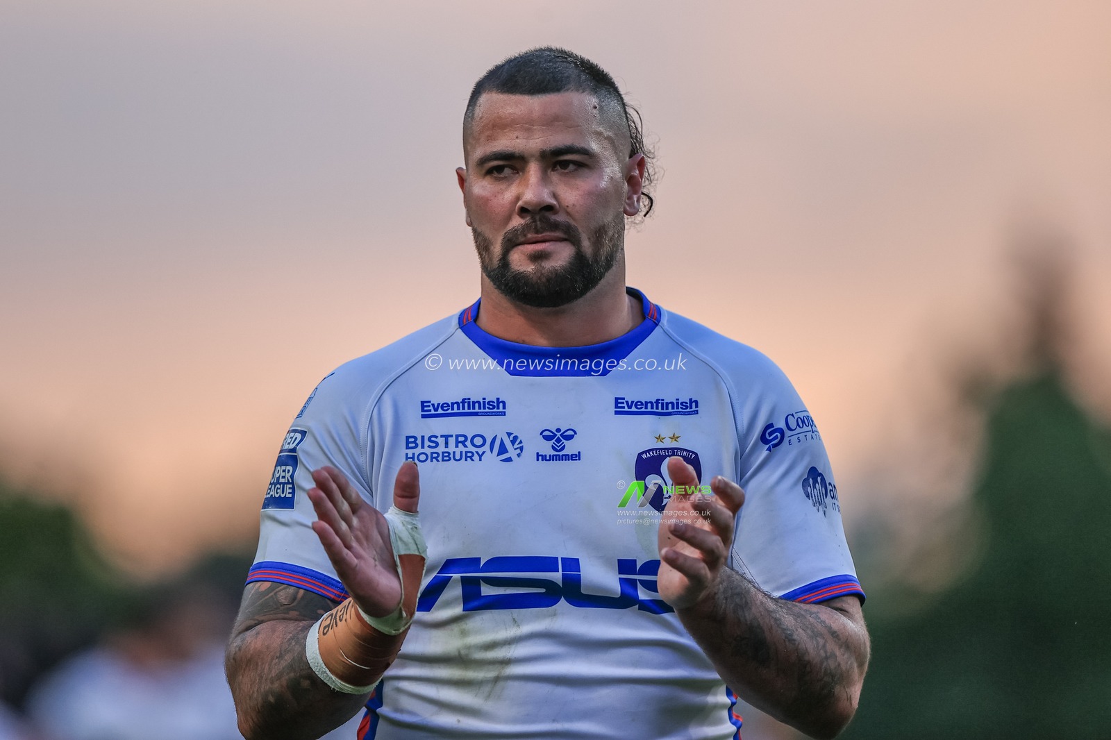 David Fifita #35 of Wakefield Trinity applauds the fans