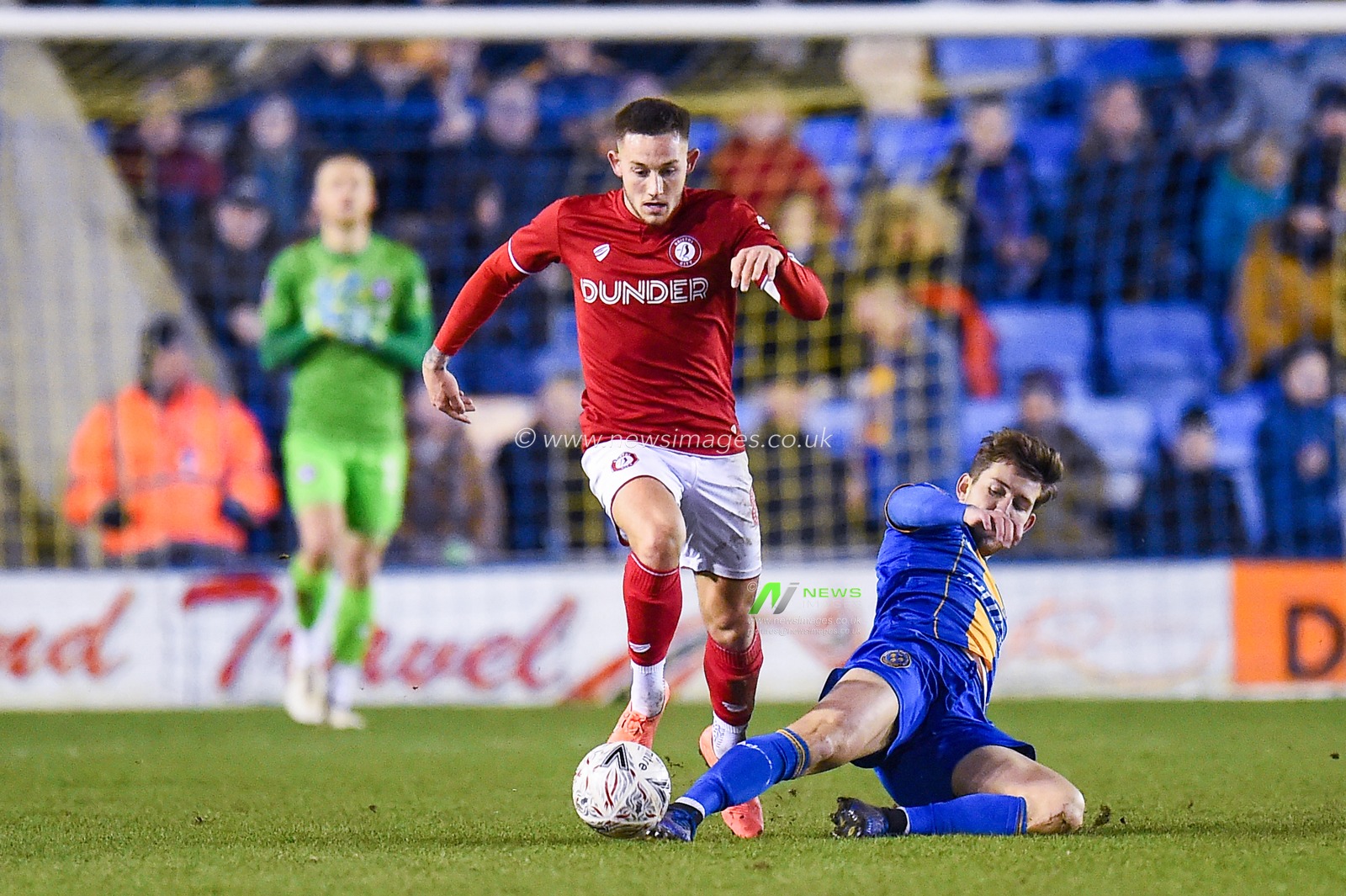 14th January 2020, Greenhous Meadow, Shrewsbury, England; Emirates FA Cup, Shrewsbury Town v Bristol City :
Josh Brownhill (8) of Bristol City controls the ball under pressure from the Shrewsbury player
Credit: Gareth Dalley/News Images