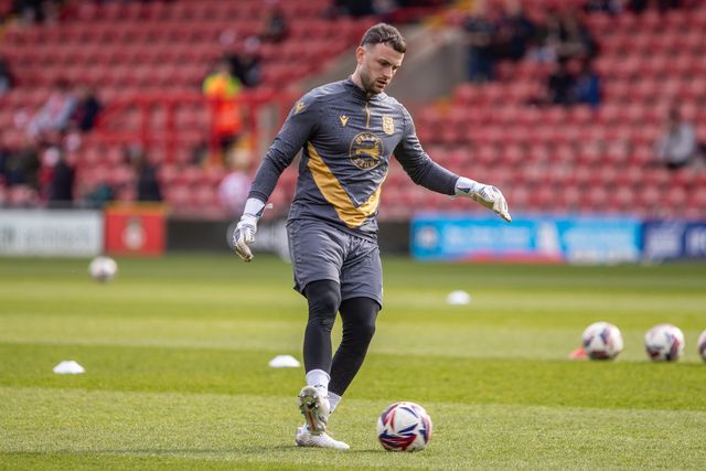 Wrexham's Callum Burton warms up during the Sky Bet League 1 match Wrexham vs Stockport County at SToK Cae Ras, Wrexham, United Kingdom, 22nd March 2025

(Photo by Nik Mesney/News Images)