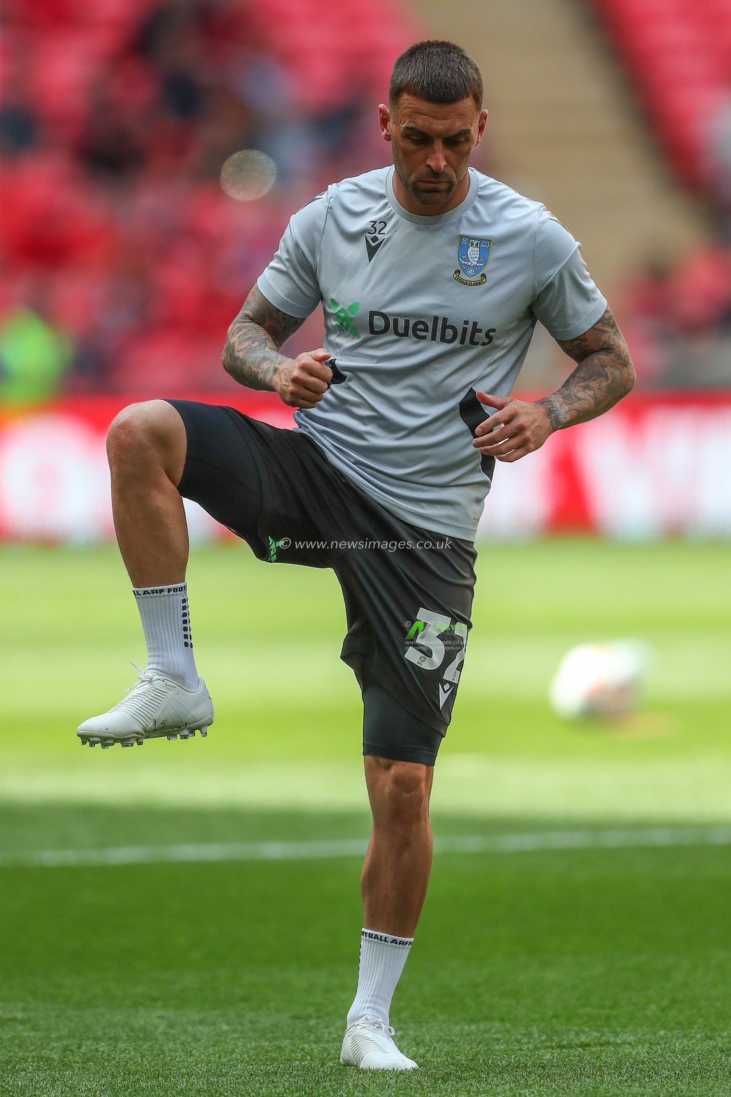 Jack Hunt #32 of Sheffield Wednesday during the warm up for the game before the Sky Bet League 1 Play-off Final match Barnsley vs Sheffield Wednesday at Wembley Stadium, London, United Kingdom, 29th May 2023

(Photo by Gareth Evans/News Images)