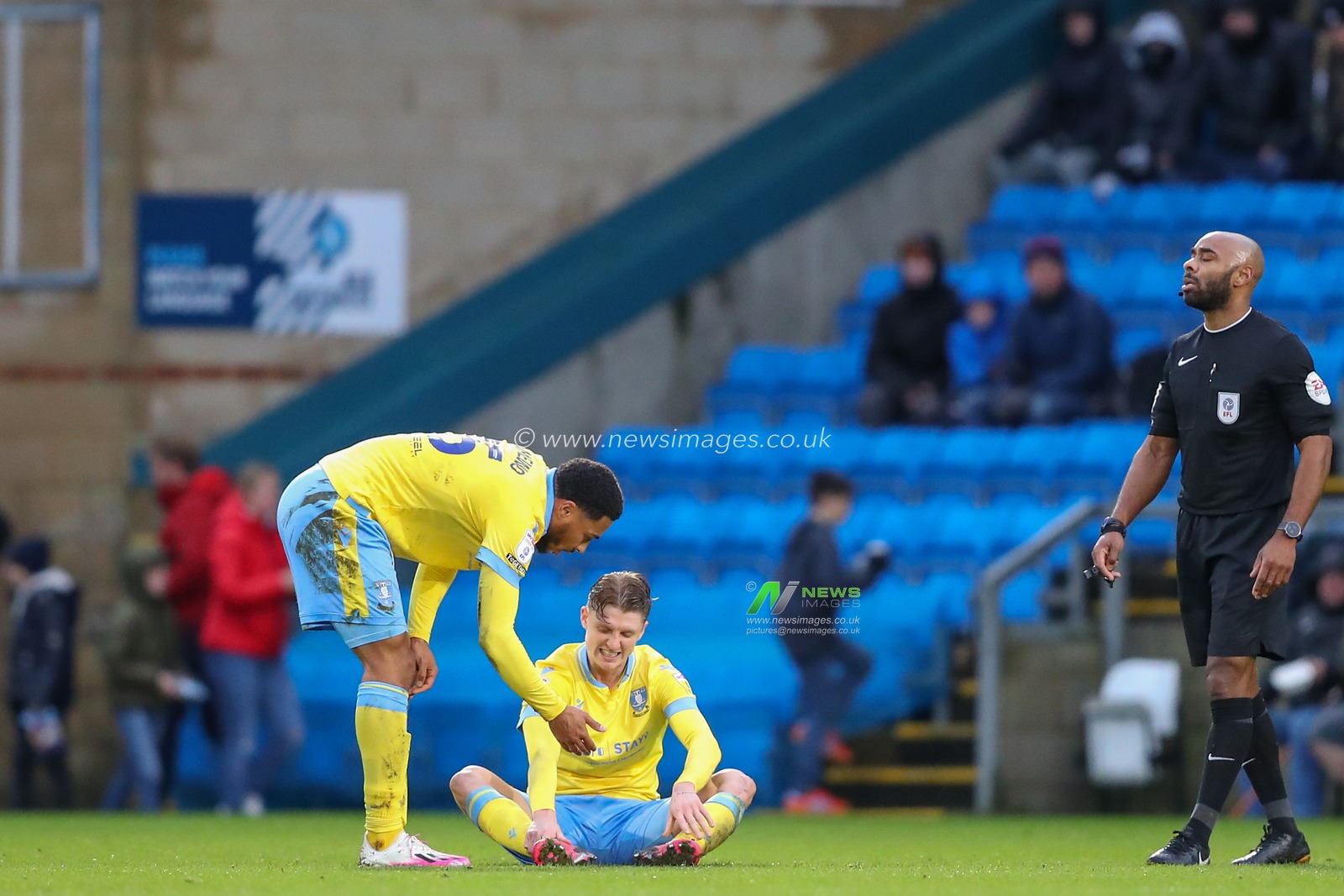 George Byers #14 of Sheffield Wednesday goes down holding his ankle during the Sky Bet League 1 match Wycombe Wanderers vs Sheffield Wednesday at Adams Park, High Wycombe, United Kingdom, 14th January 2023

(Photo by Gareth Evans/News Images)