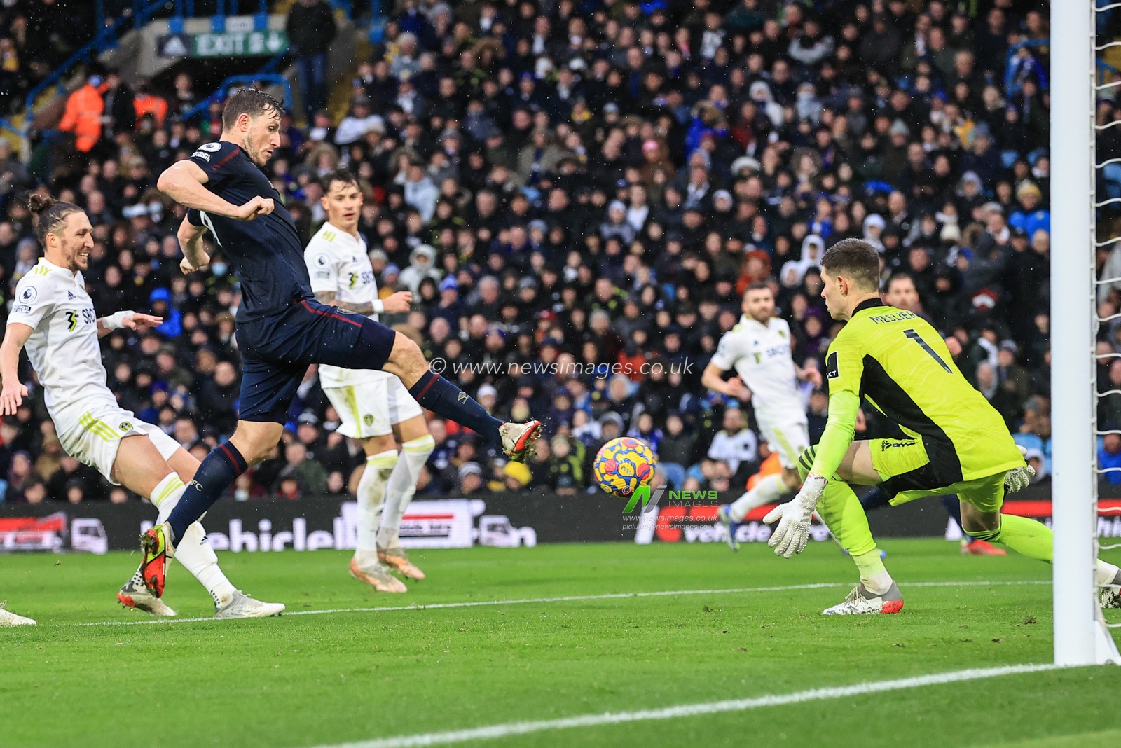 Illan Meslier #1 of Leeds United saves a shot from Chris Wood #9 of Burnley at close range