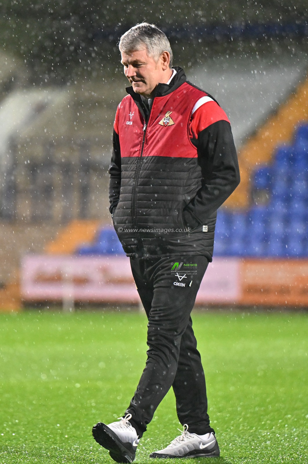 Lee Glover first team coach of Doncaster Rovers Football Club inspects the pitch ahead of the match, during the Sky Bet League 2 match Tranmere Rovers vs Doncaster Rovers at Prenton Park, Birkenhead, United Kingdom, 20th October 2023

(Photo by Cody Froggatt/News Images)