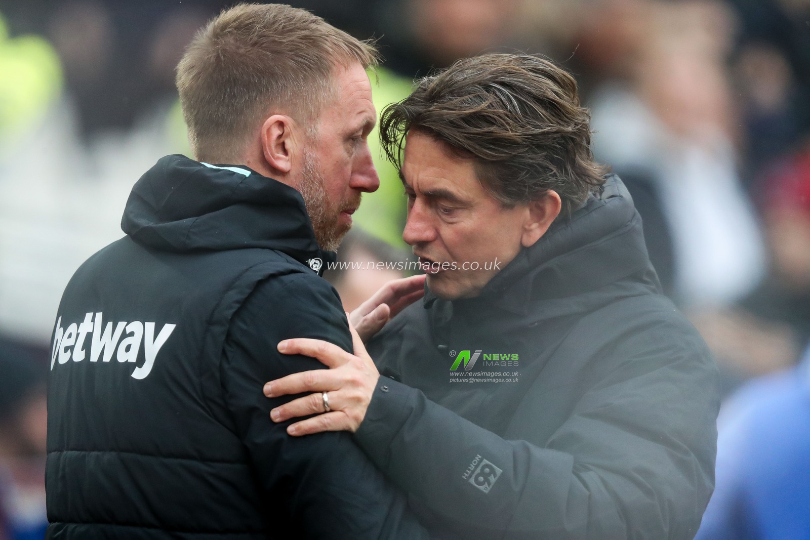 Graham Potter of West Ham United speaks to Thomas Frank of Brentford prior to the Premier League match West Ham United vs Brentford at London Stadium, London, United Kingdom, 15th February 2025

(Photo by Izzy Poles/News Images)