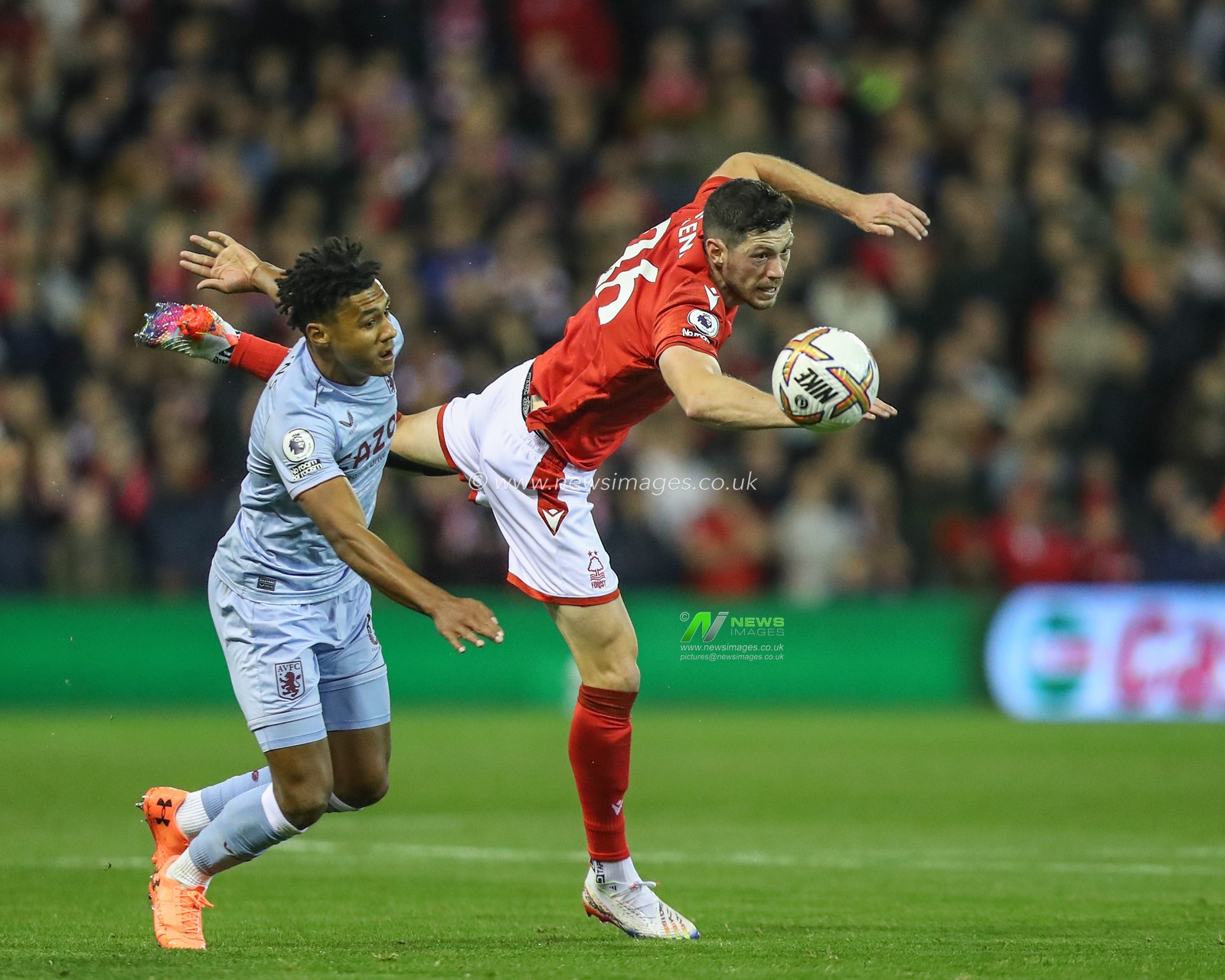 Ollie Watkins #11 of Aston Villa and Scott McKenna #26 of Nottingham Forest battle for the ball during the Premier League match Nottingham Forest vs Aston Villa at City Ground, Nottingham, United Kingdom, 10th October 2022

(Photo by Gareth Evans/News Images)