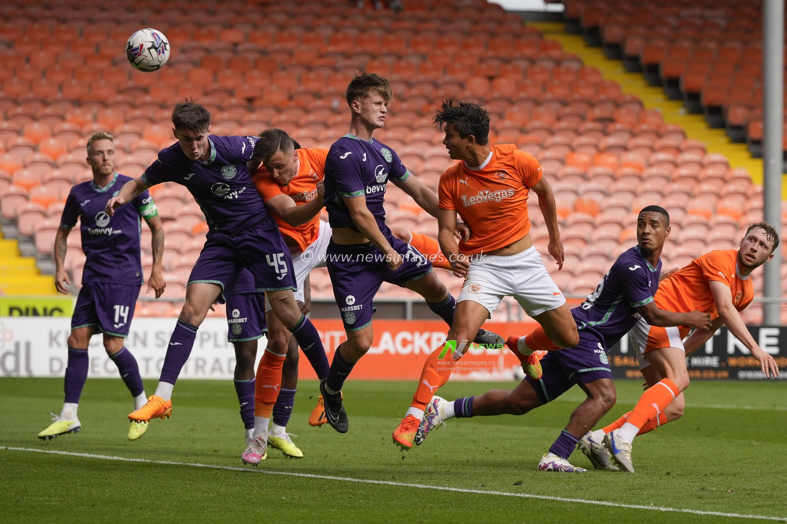 Kenny Dougall #12 of Blackpool heads homes his sides second goal during the Pre-season friendly match Blackpool vs Hibernian at Bloomfield Road, Blackpool, United Kingdom, 29th July 2023

(Photo by Steve Flynn/News Images)
