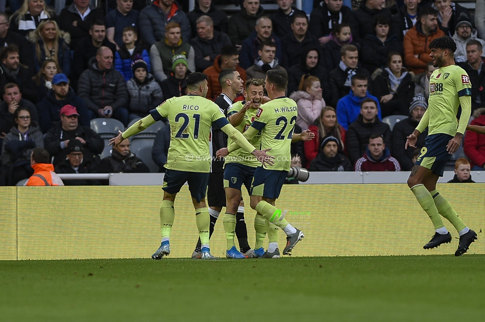 9th November 2019, St. James's Park, Newcastle, England; Premier League, Newcastle United v Bournemouth : Harry Wilson (22) of Bournemouth celebrates with his team mates after scoring

Credit: Iam Burn/News Images