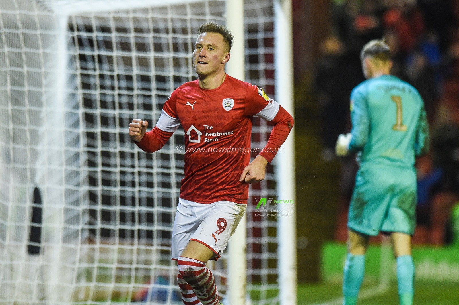 14th December 2019, Oakwell, Barnsley, England; Sky Bet Championship, Barnsley v Queens Park Rangers : Cauley Woodrow (9) of Barnsley FC celebrates his penalty.
Credit: Dean Williams/News Images