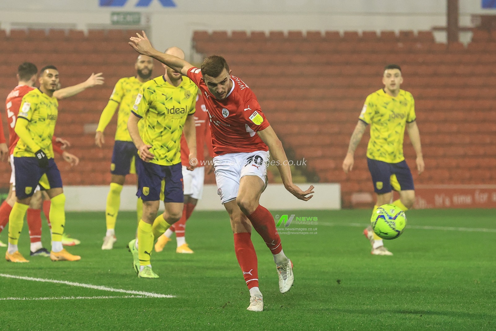 MichaÅ‚ Helik #30 of Barnsley clears the ball