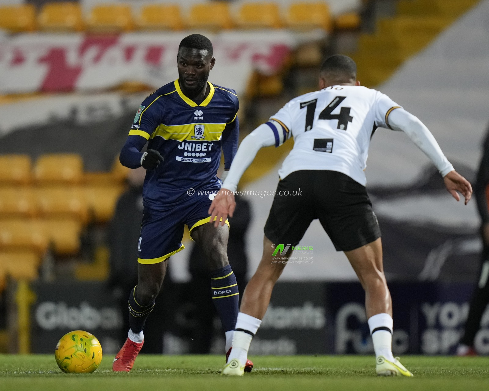 Emmanuel Latte Lath #9 of Middlesbrough runs at Funso Ojo #14 of Port Vale during the Carabao Cup Quarter Final match Port Vale vs Middlesbrough at Vale Park, Burslem, United Kingdom, 19th December 2023

(Photo by Steve Flynn/News Images)