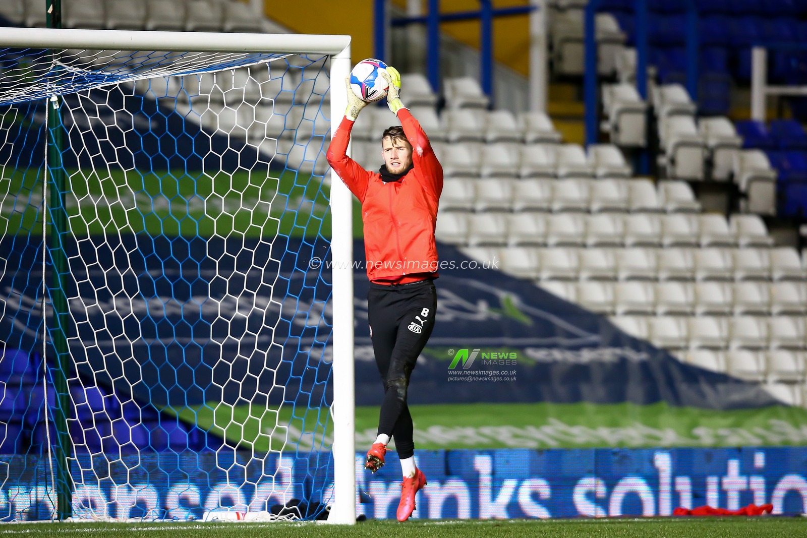 Bradley Collins #40 of Barnsley warming up ahead of the game against Birmingham City