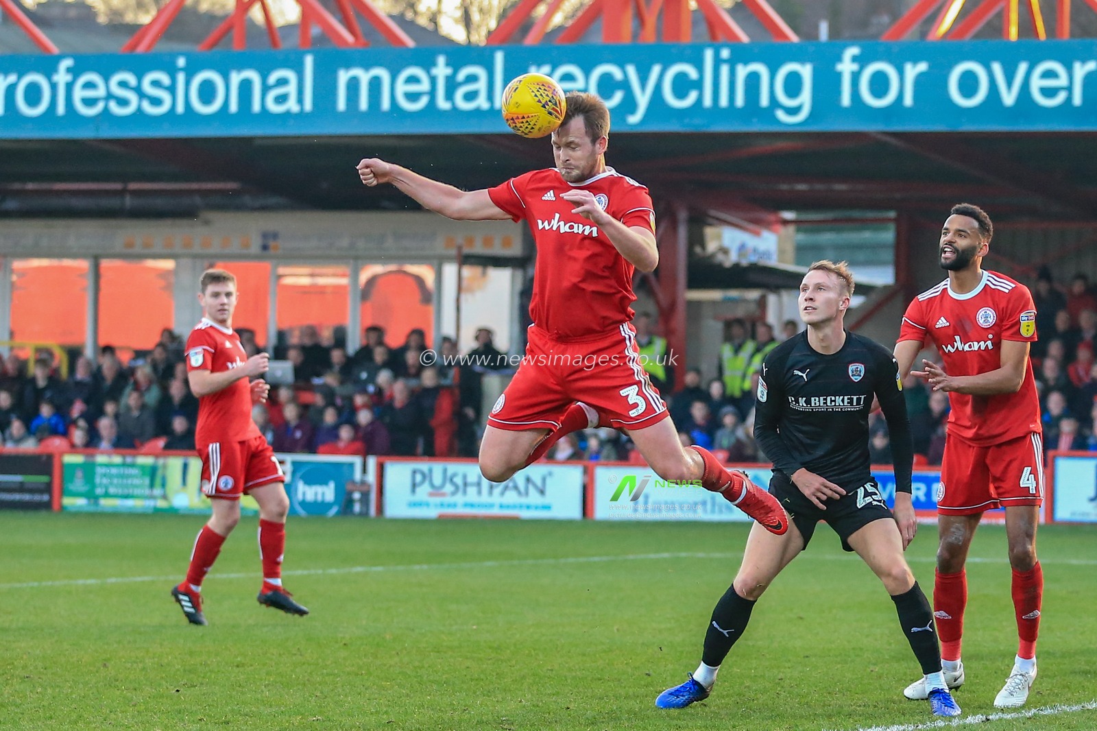 17th November 2018, Crown Ground, Accrington, England; Sky Bet League One, Accrington Stanley v Barnsley ; Mark Hughes (03) of Accrington Stanley heads the ball clear 


Credit: Mark Cosgrove/News Images

English Football League images are subject to DataCo Licence