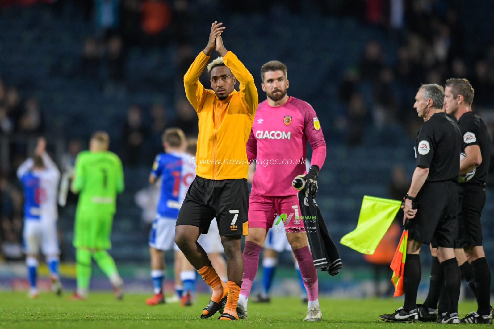 Mallik Wilks #7 of Hull City applauds the travelling supporters at the end of the game