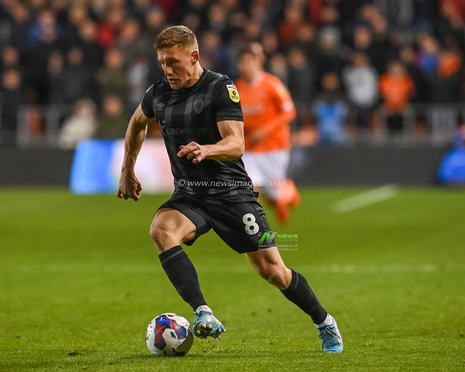 Greg Docherty #8 of Hull City makes a break with the ball  during the Sky Bet Championship match Blackpool vs Hull City at Bloomfield Road, Blackpool, United Kingdom, 19th October 2022

(Photo by Craig Thomas/News Images)