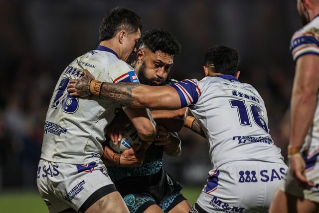 Isaac Liu of Leigh Leopards is tackled by Isaiah Vagana of Wakefield Trinity and Renouf Atoni of Wakefield Trinity during the Betfred Challenge Cup Quarter Final match Wakefield Trinity vs Leigh Leopards at DIY Kitchens Stadium, Wakefield, United Kingdom, 4th April 2025

(Photo by Alfie Cosgrove/News Images)