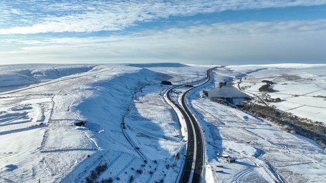 Heavy Snow over the hills of Scammonden Bridge and Booth Wood Reservoir areas of West Yorkshire and a free running M62 where the farm house sits in the middle of the motorway, Kirklees, United Kingdom, 11th January 2025

(Photo by Mark Cosgrove/News Images)