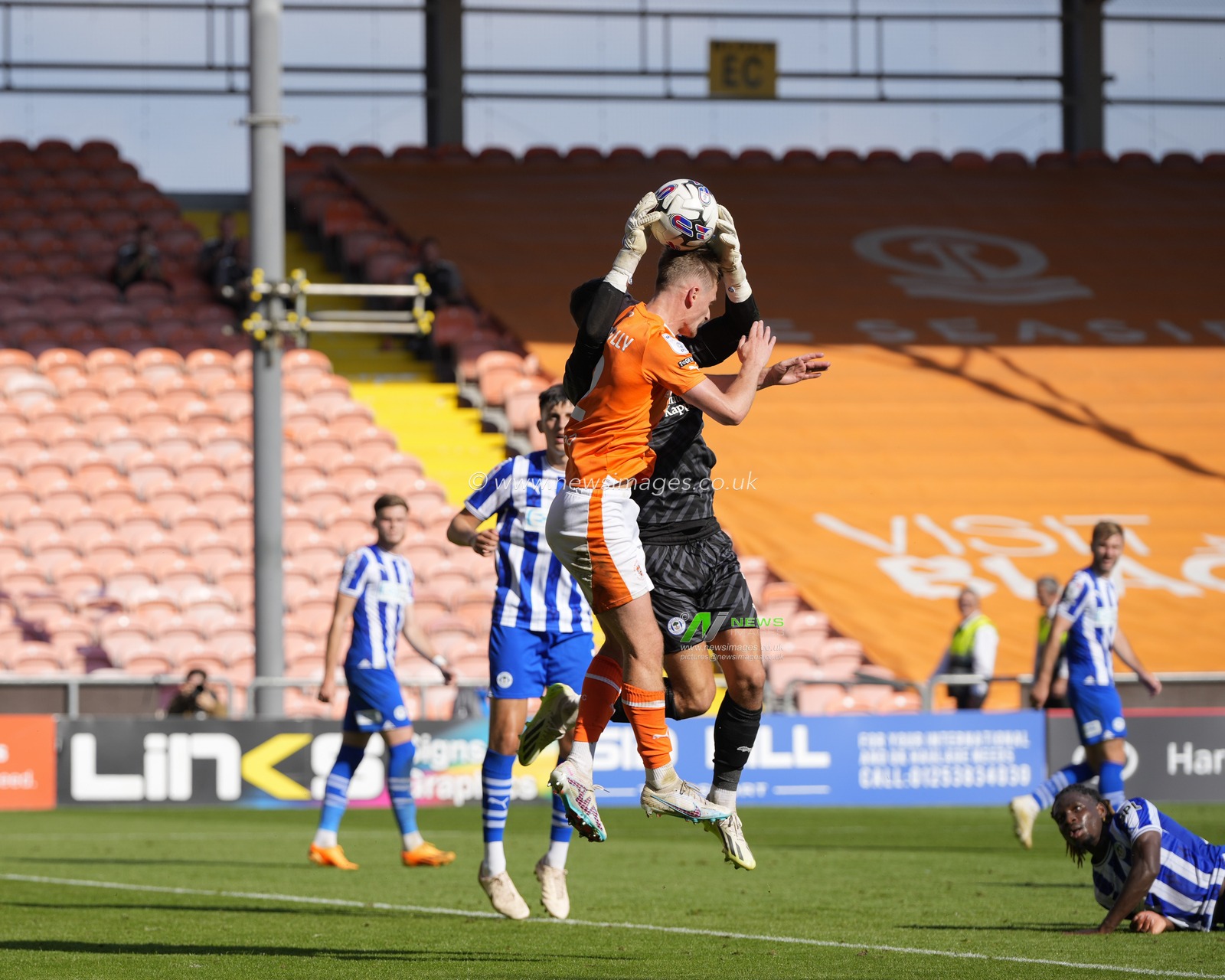 Sam Tickle #1 of Wigan Athletic competes for a cross with Callum Connolly #2 of Blackpool during the Sky Bet League 1 match Blackpool vs Wigan Athletic at Bloomfield Road, Blackpool, United Kingdom, 2nd September 2023

(Photo by Steve Flynn/News Images)