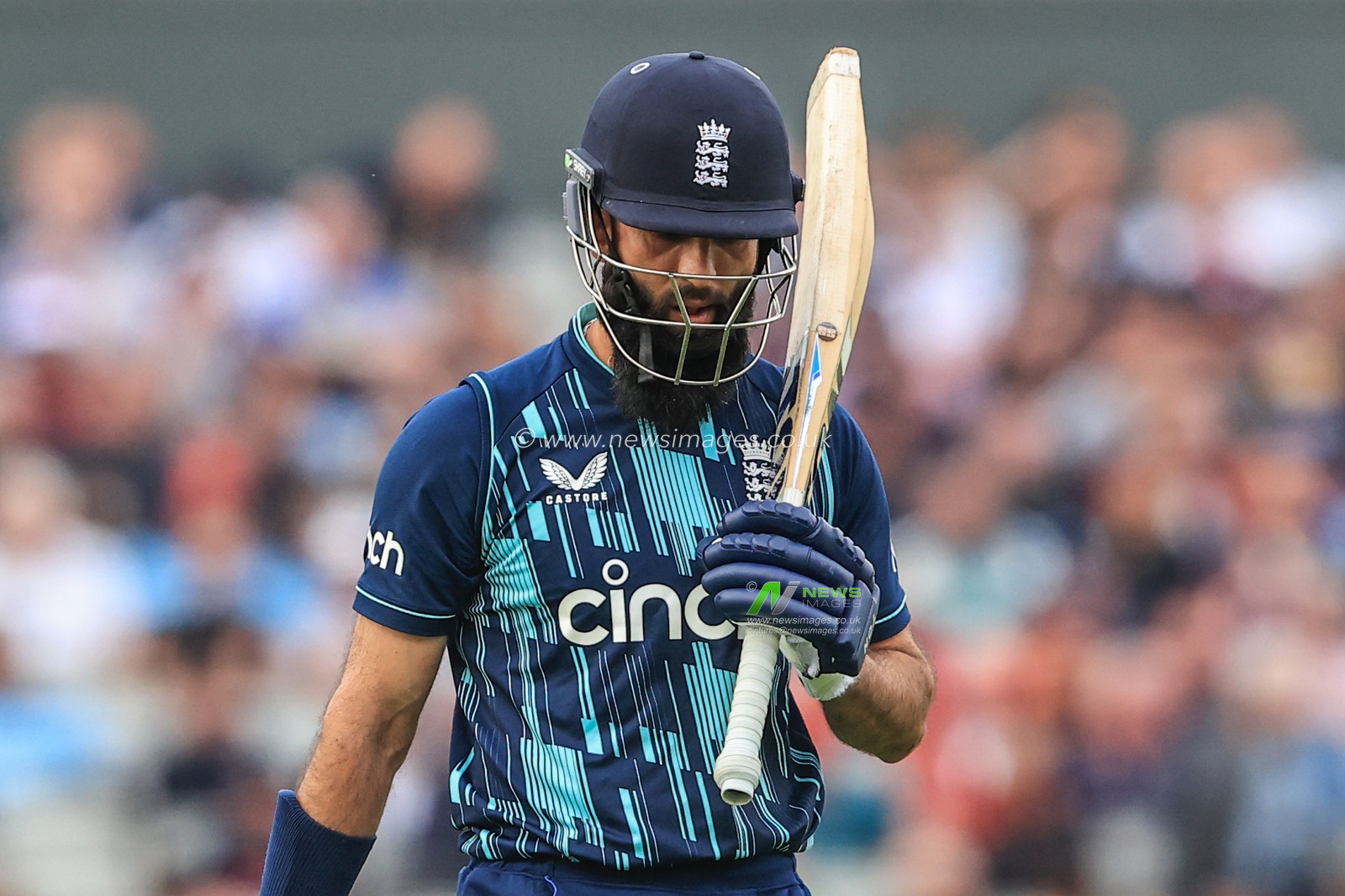 A dejected Moeen Ali of England leaves the field after heâ€™s caught out by Anrich Nortje of South Africa