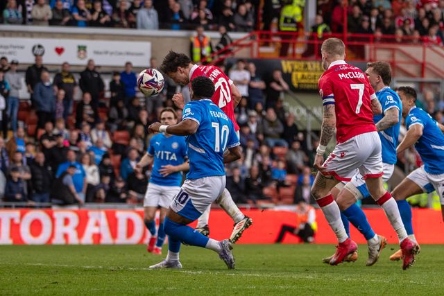 Wrexham's Oliver Rathbone heads towards goal during the Sky Bet League 1 match Wrexham vs Stockport County at SToK Cae Ras, Wrexham, United Kingdom, 22nd March 2025

(Photo by Nik Mesney/News Images)