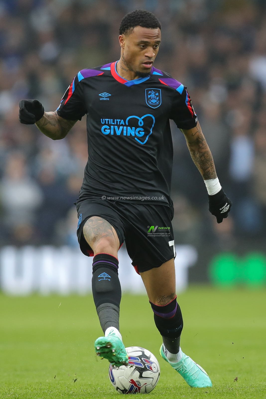 Delano Burgzorg #7 of Huddersfield Town on the ball during the Sky Bet Championship match Leeds United vs Huddersfield Town at Elland Road, Leeds, United Kingdom, 28th October 2023

(Photo by James Heaton/News Images)