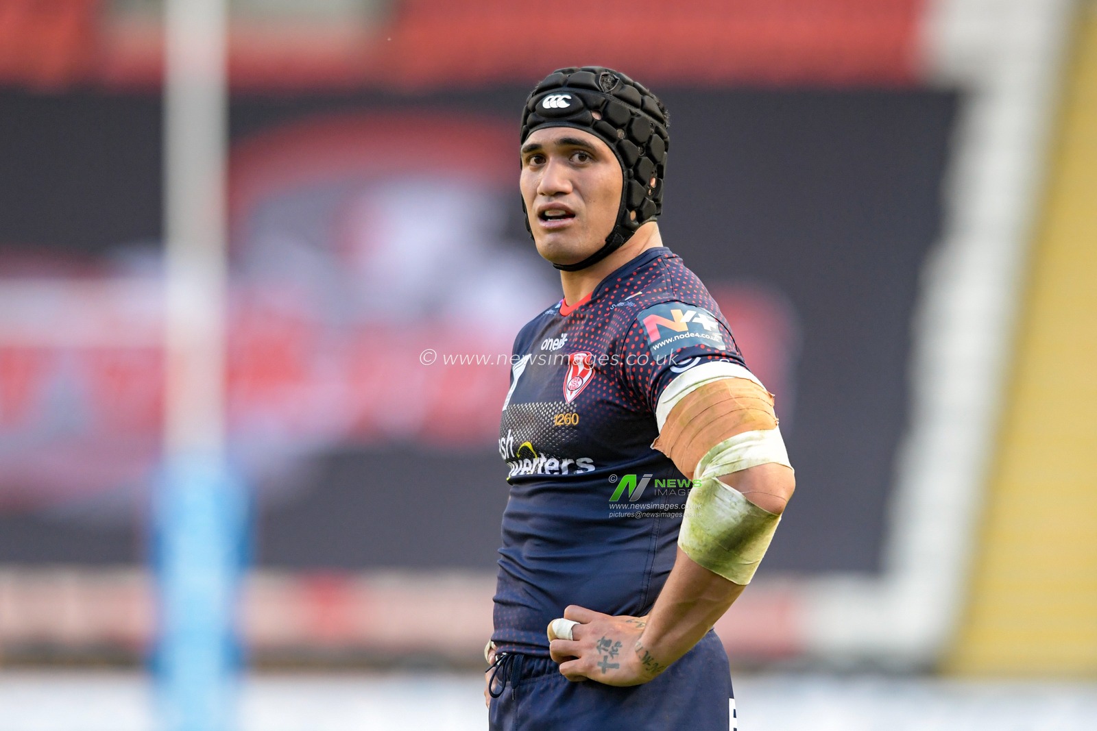 Sione Mata'utia (14) of St Helens in action during the game