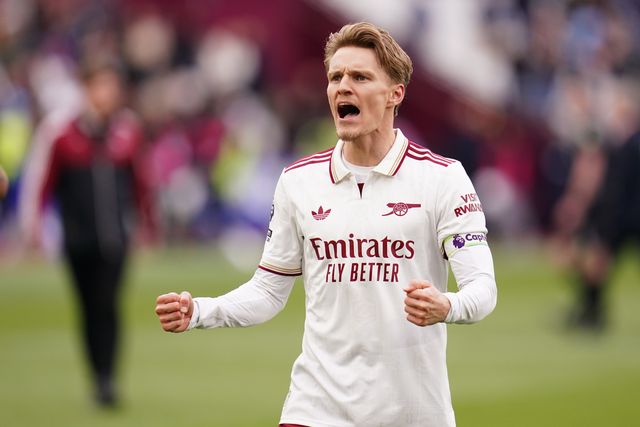 Martin Ødegaard of Arsenal celebrates win at full time with support during the Premier League match West Ham United vs Arsenal at London Stadium, London, United Kingdom on 10 May 2026

(Photo by Harvey Murphy/News Images)