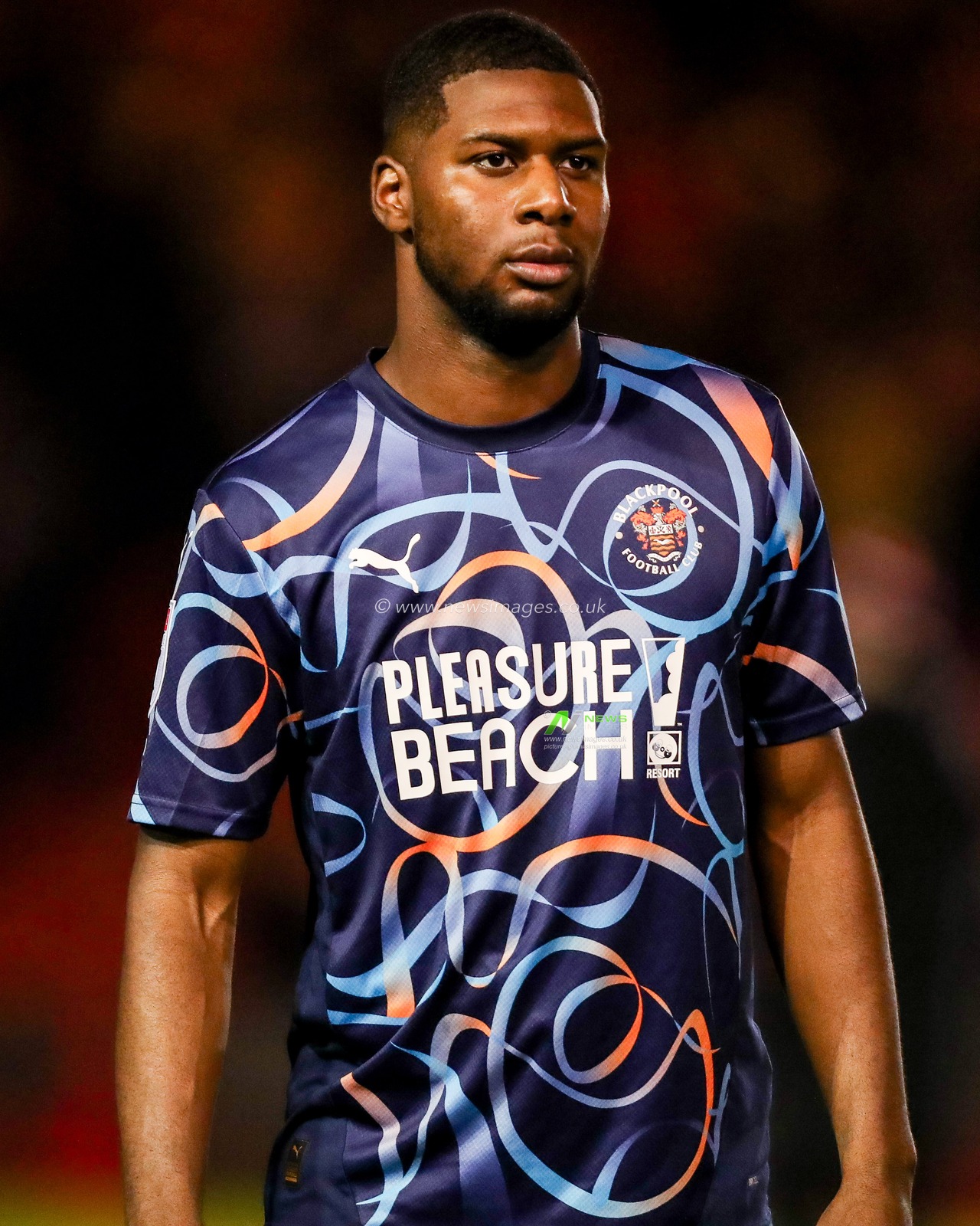 Odeluga Offiah of Blackpool looks on prior to the Sky Bet League 1 match Lincoln City vs Blackpool at Gelder Group Sincil Bank Stadium, Lincoln, United Kingdom, 28th January 2025

(Photo by Izzy Poles/News Images)